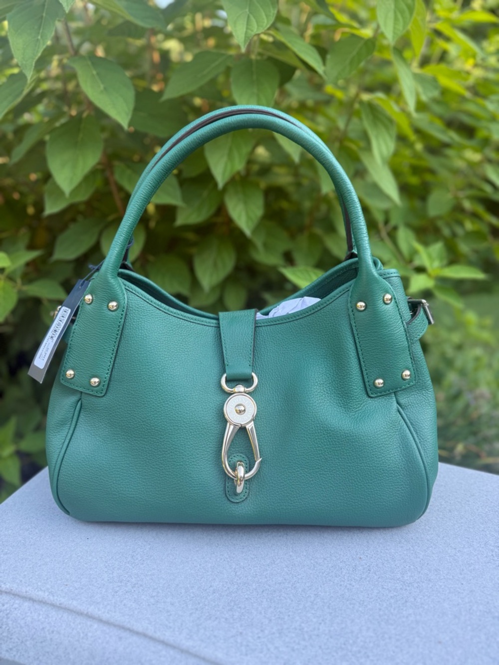Dooney & Bourke NWT Belvedere Medium Logo Lock in the color Leaf